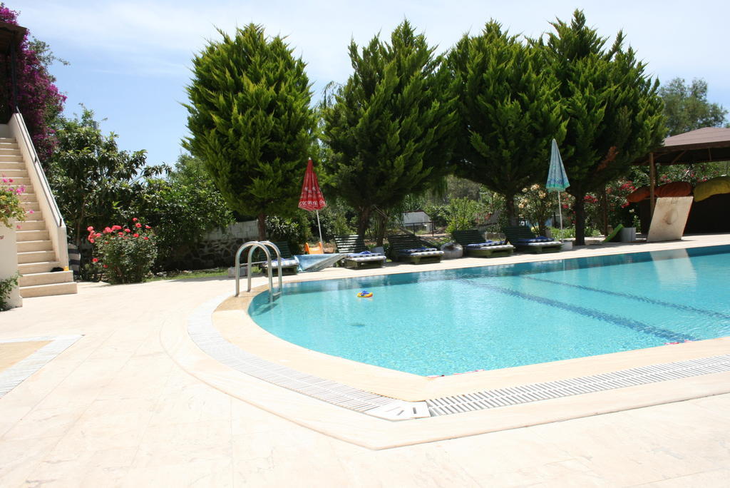 אפרטהוטל Paradise Garden Gumusluk Evleri מראה חיצוני תמונה