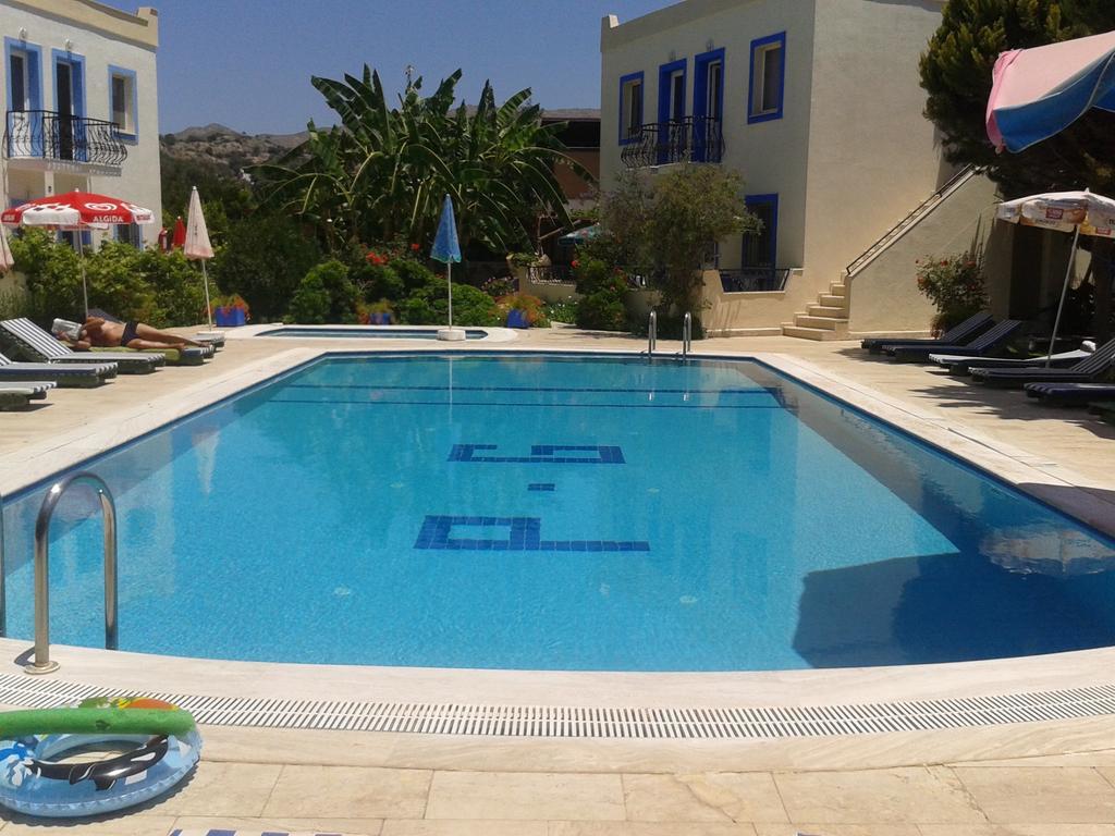 אפרטהוטל Paradise Garden Gumusluk Evleri מראה חיצוני תמונה