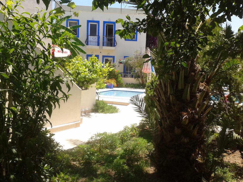 אפרטהוטל Paradise Garden Gumusluk Evleri מראה חיצוני תמונה