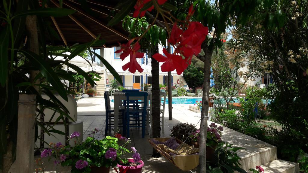 אפרטהוטל Paradise Garden Gumusluk Evleri מראה חיצוני תמונה