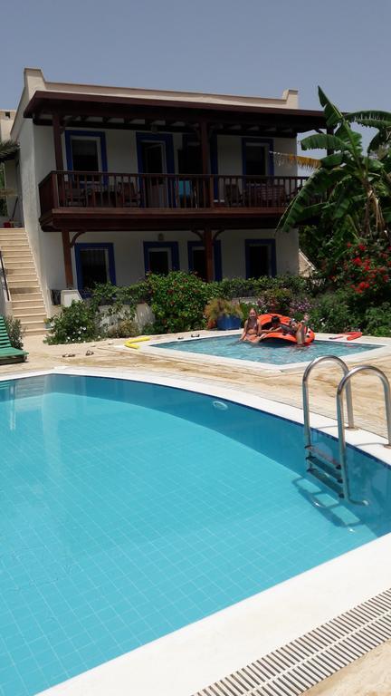 אפרטהוטל Paradise Garden Gumusluk Evleri מראה חיצוני תמונה