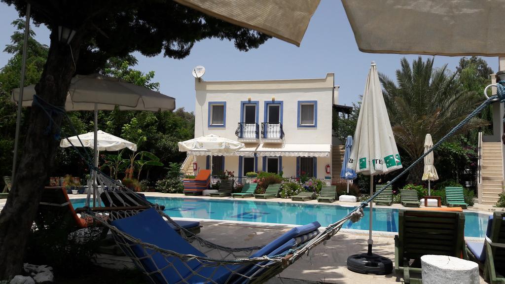 אפרטהוטל Paradise Garden Gumusluk Evleri מראה חיצוני תמונה