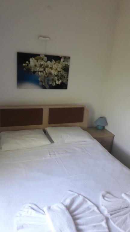 אפרטהוטל Paradise Garden Gumusluk Evleri חדר תמונה